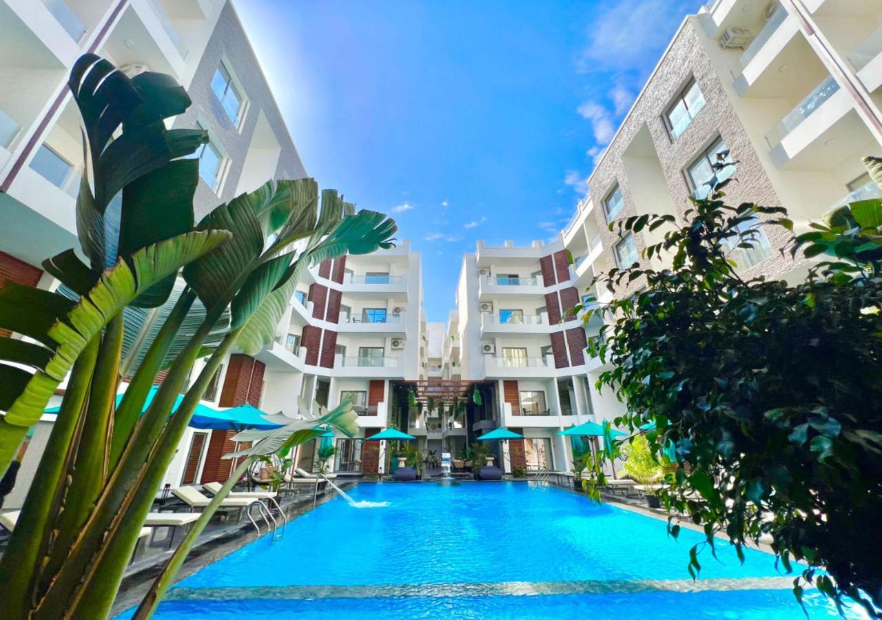 Sanctuary Sunlit Hurghada Haven With 4 Pools, Rooftop Sunsets & Gourmet Bites Steps Away Экстерьер фото