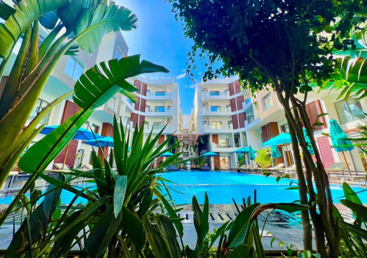 Sanctuary Sunlit Hurghada Haven With 4 Pools, Rooftop Sunsets & Gourmet Bites Steps Away Экстерьер фото