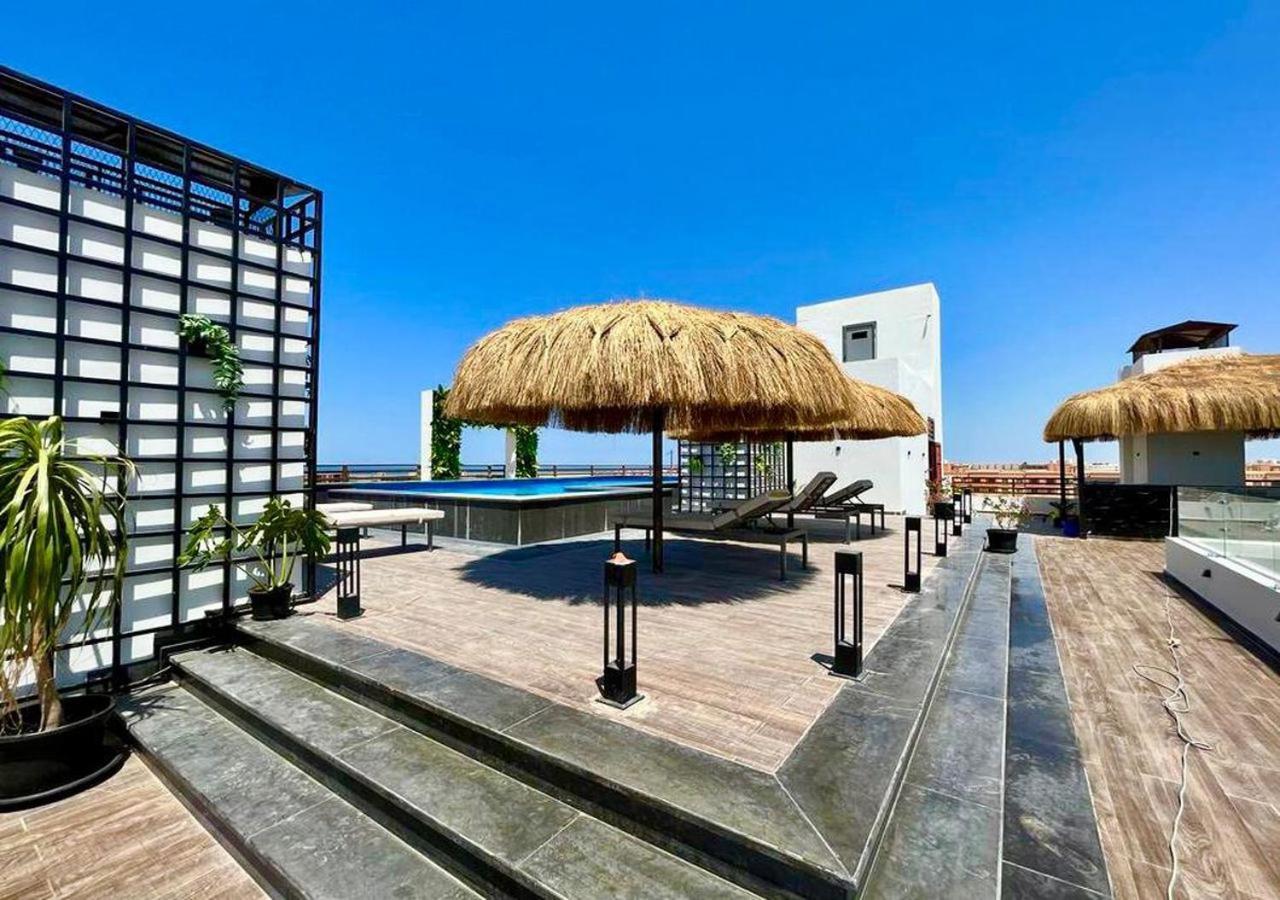Sanctuary Sunlit Hurghada Haven With 4 Pools, Rooftop Sunsets & Gourmet Bites Steps Away Экстерьер фото