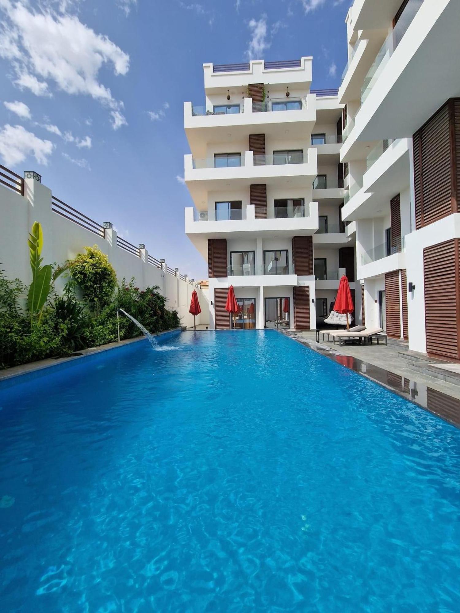 Sanctuary Sunlit Hurghada Haven With 4 Pools, Rooftop Sunsets & Gourmet Bites Steps Away Экстерьер фото